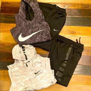2 sets of boys Nike outfits.